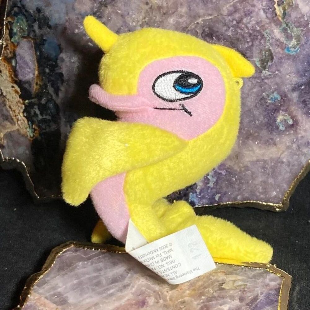 Yellow flotsam neopets mini plush toy